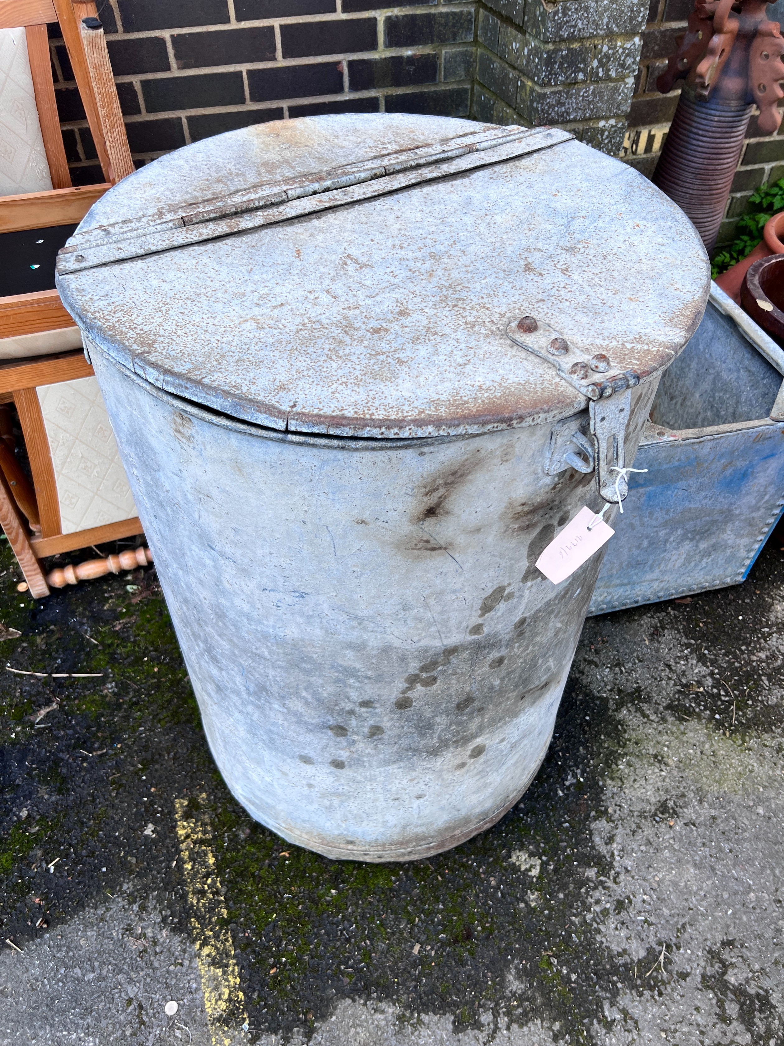 A vintage galvanised circular grain bin, diameter 66cm, height 90cm *Please note the sale commences at 9am.
